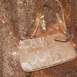 Coach metallic wristlet